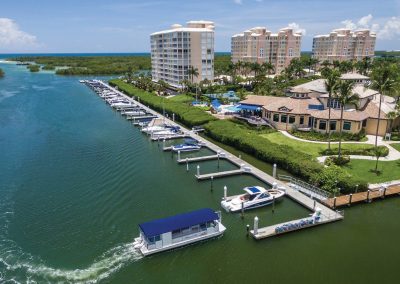 yacht and boat dock in the river surrounding buildings